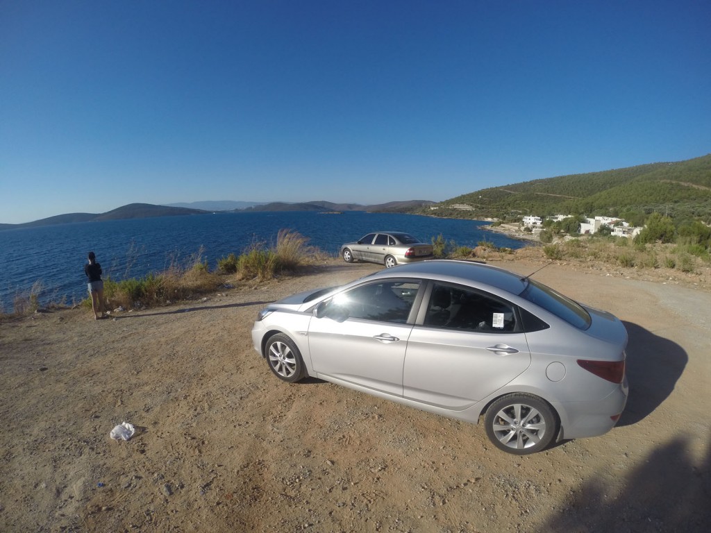 Our rental Hyundai Accent 1.6 CRDi Automatic by the beach at Bodrum.