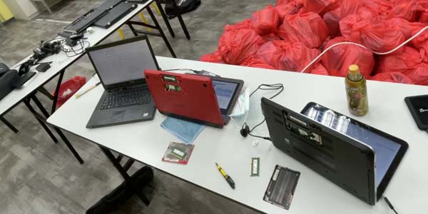 Photos of laptops being repaired and refurbished at the FSC